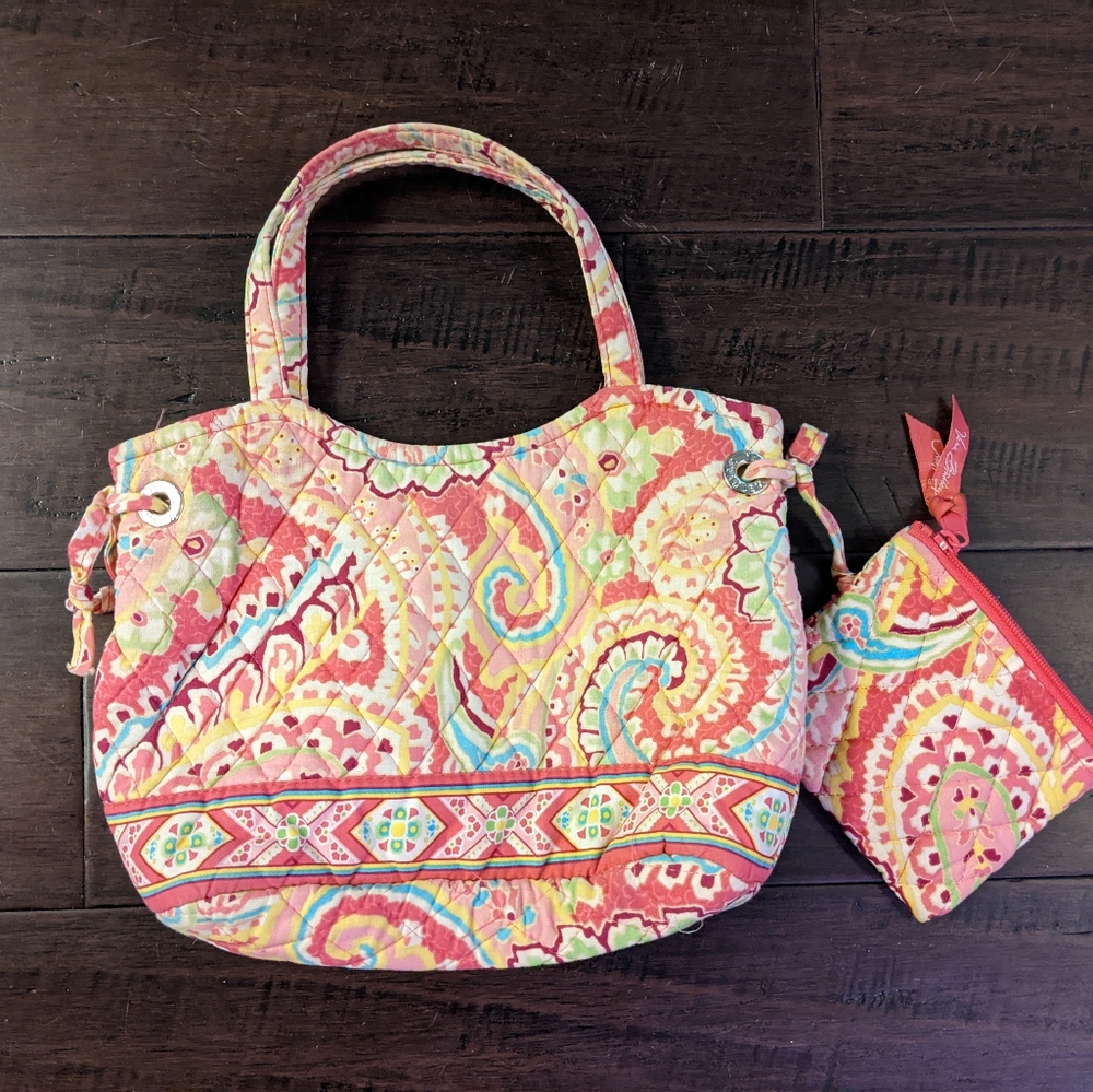 Vera Bradley purse with matching coin pouch.
